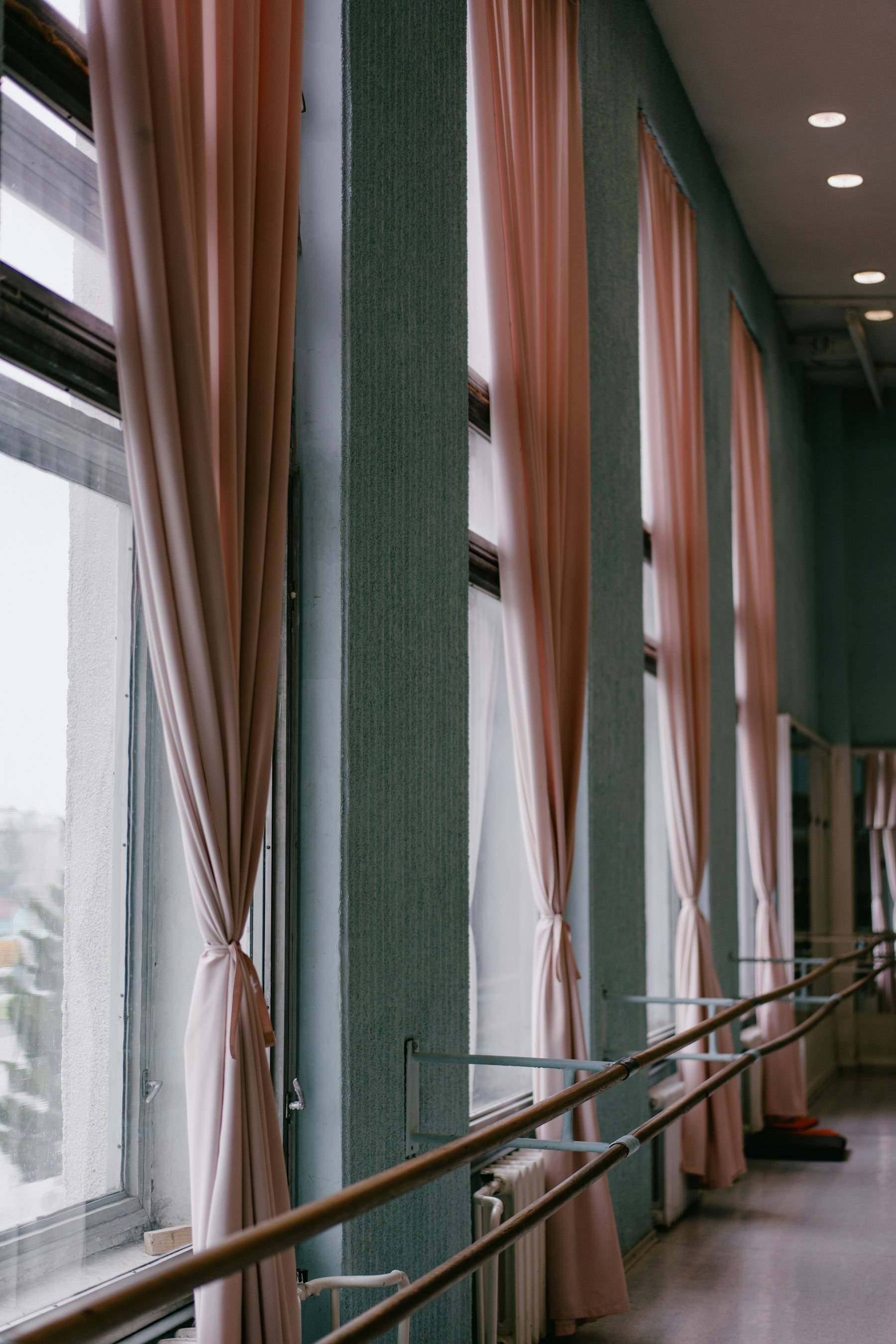 A light-filled dance studio ready for rehearsal